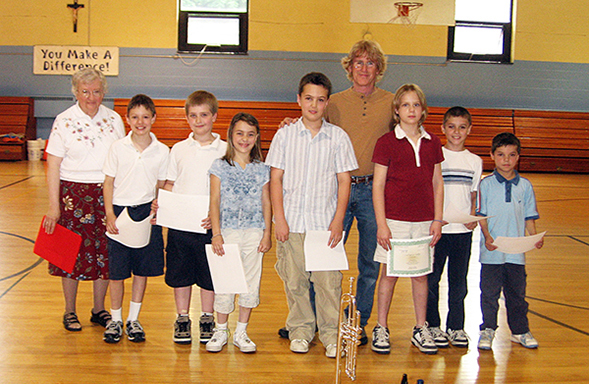 Charlie with Scholarship Recipients 2004