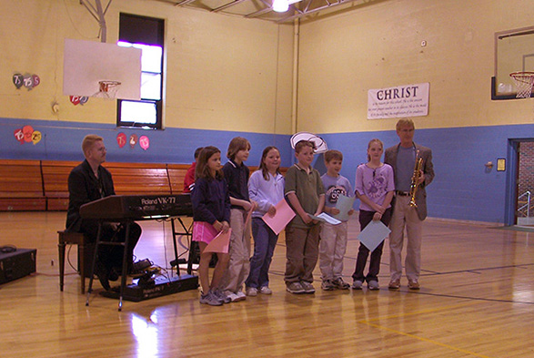 Charlie with Scholarship Recipients 2002